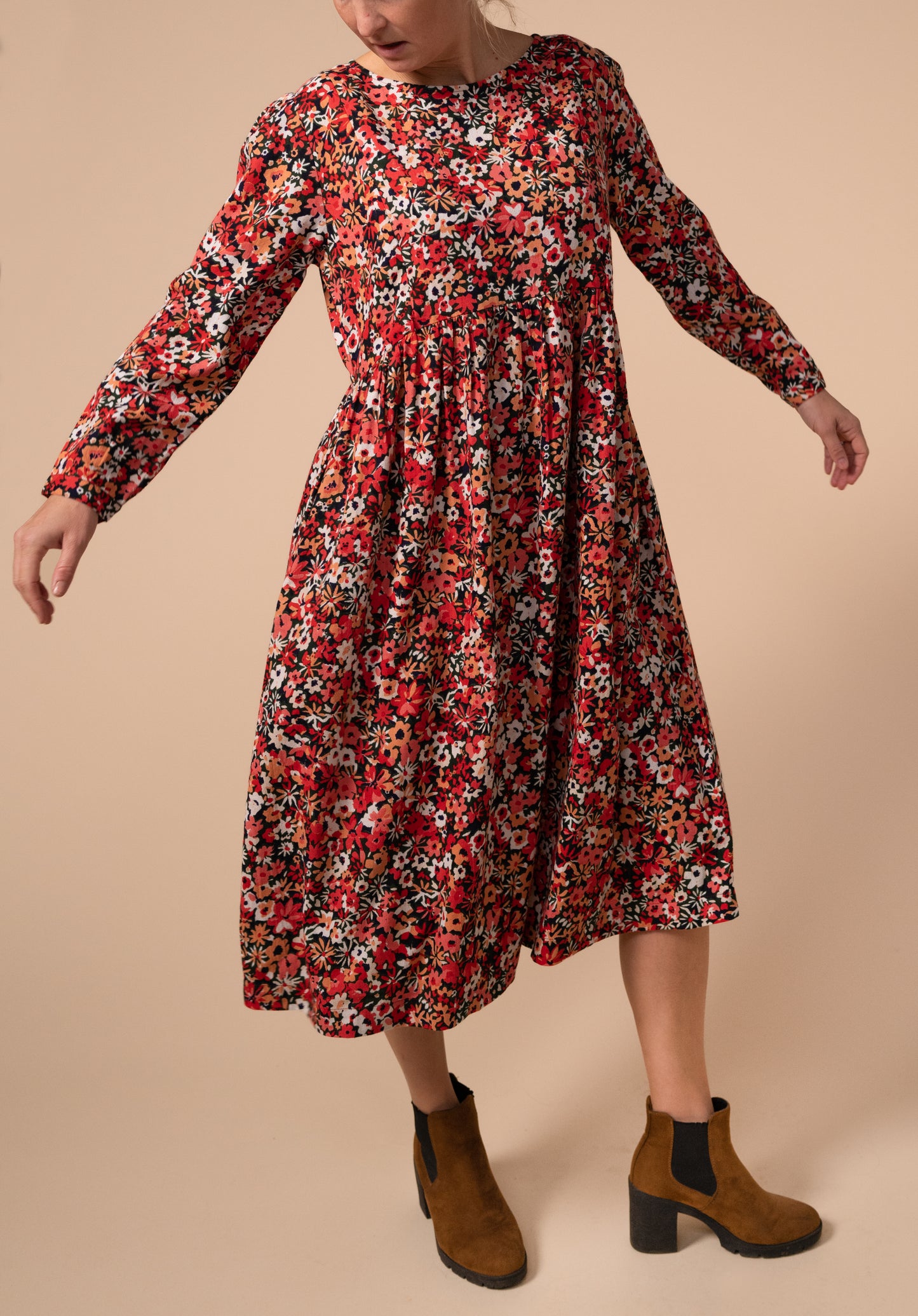 Image show the movement of the Martha Breastfeeding friendly dress